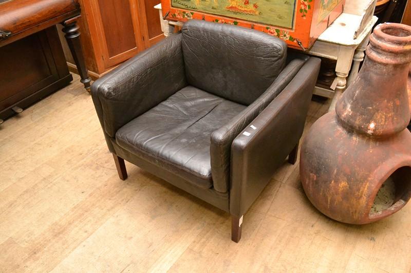 Appraisal: A DANISH DARK BROWN LEATHER ARMCHAIR A DANISH DARK BROWN