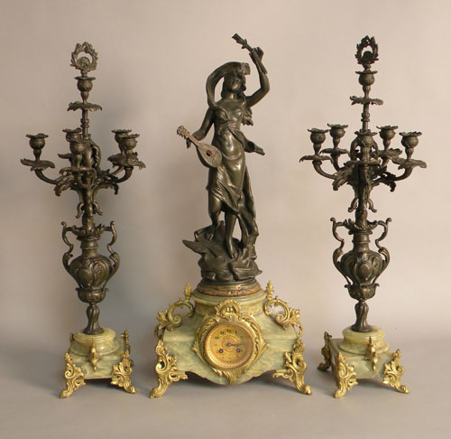 Appraisal: Massive bronzed spelter and green marble three part mantle set