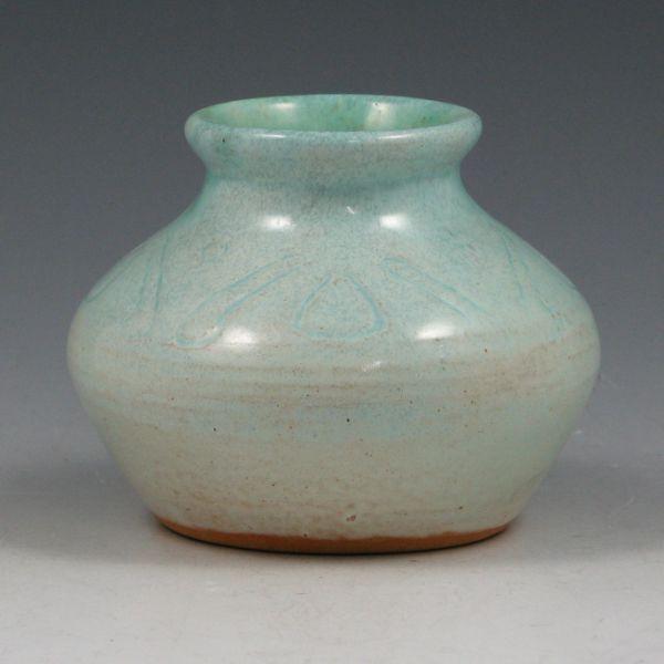 Appraisal: Shearwater squat vase with incised decoration and finished in a