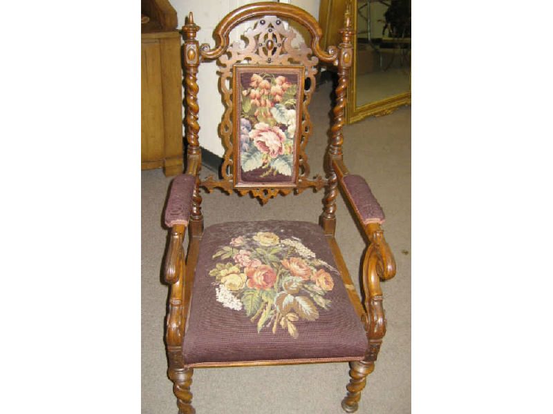 Appraisal: CONTINENTAL TH CENTURY ROSEWOOD ARMCHAIR Arched top rail over the