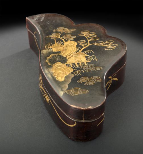 Appraisal: Japanese Black-and-Gold Lacquered Incense Box Meiji Period - of leaf