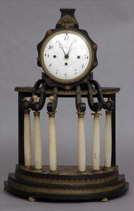 Appraisal: AUSTRIAN BIEDERMEIER BRASS-MOUNTED EBONIZED AND ALABASTER COLUMN CLOCK The in