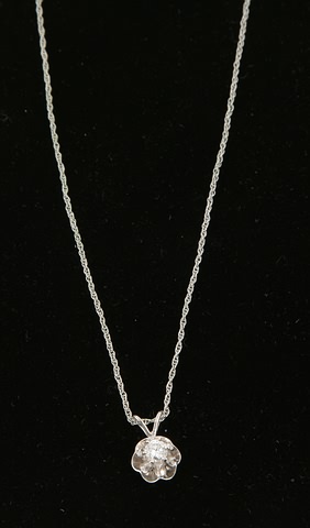 Appraisal: KW rope chain Buttercup style setting mm round diamond clarity