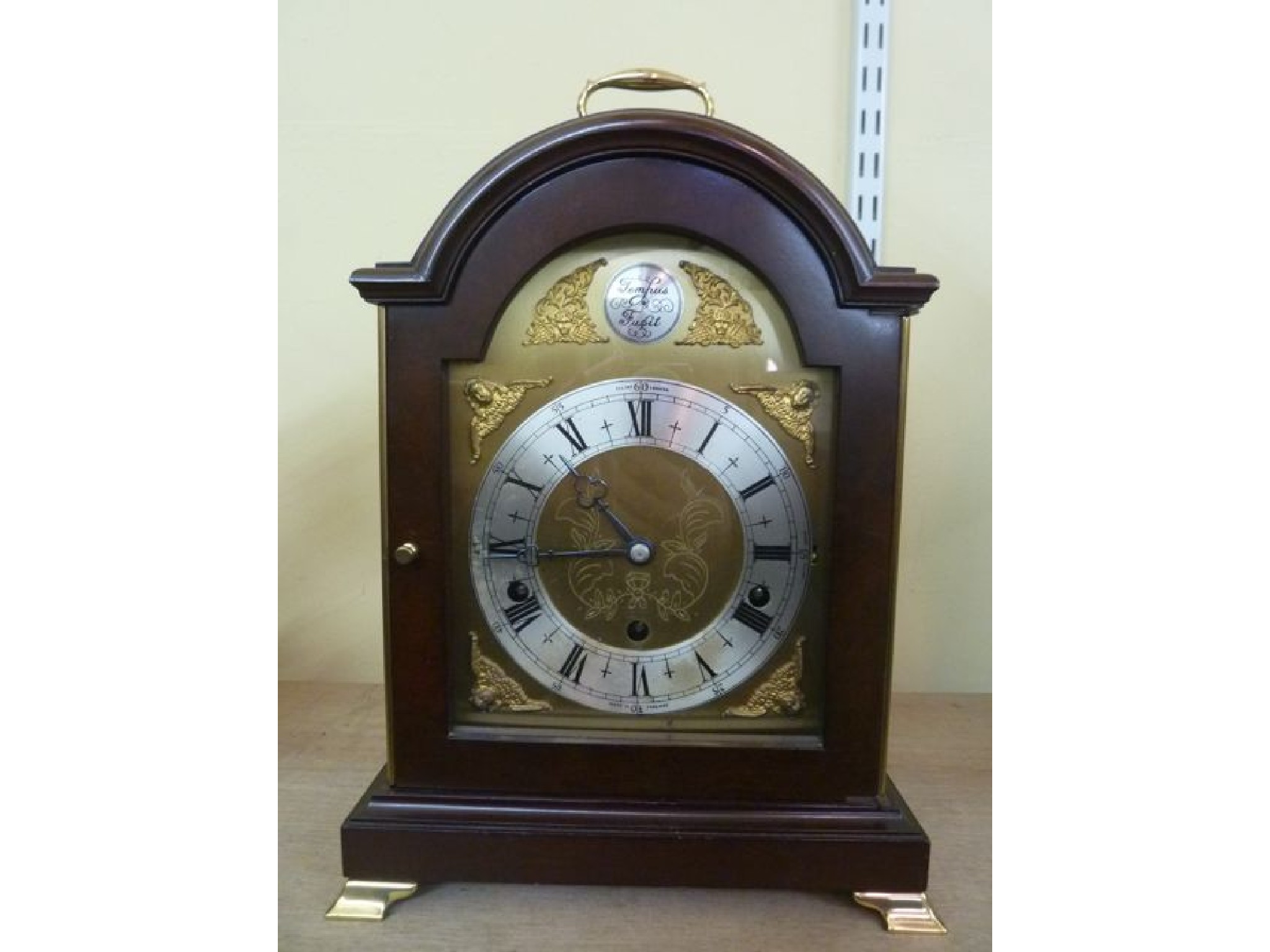 Appraisal: A reproduction bracket clock by Elliott of London the three