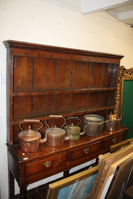 Appraisal: A GEORGE III OAK AND FRUITWOOD SMALL DRESSER with raised