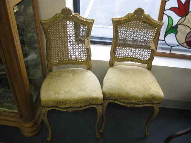 Appraisal: Pair of French Gilt Carved Chairs silk brocade seats cane