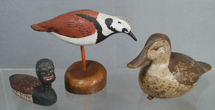 Appraisal: carved wood bird decoys small duck a duck with African