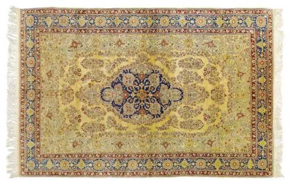 Appraisal: HEREKE silk old Blue central medallion on a yellow ground