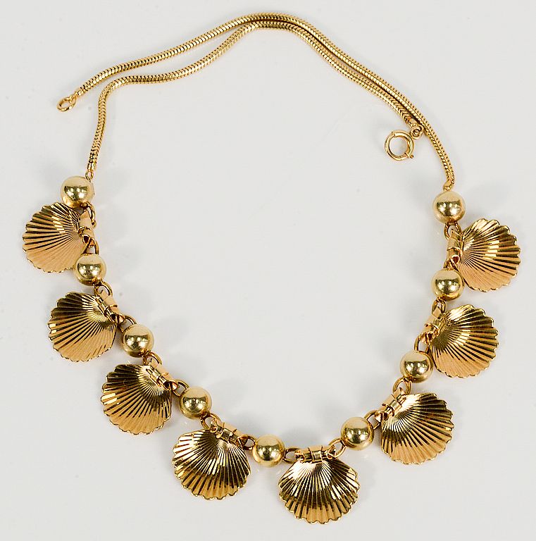 Appraisal: karat necklace with scallop shells and beads on plain gold