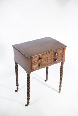 Appraisal: A Regency mahogany work table the hinged cover over a