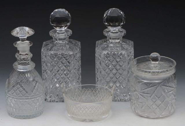 Appraisal: A PAIR OF HEAVY GLASS DECANTERS and stoppers cm a