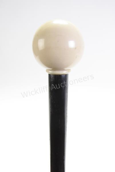 Appraisal: Erotic Whip Cane solid ebony shaft with sphere handle hidden