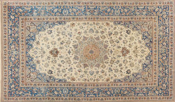 Appraisal: NAIN ORIENTAL CARPET Dark blue background with beige central medallion