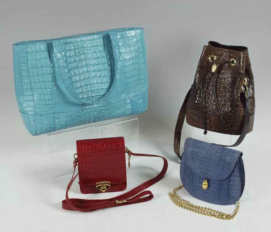 Appraisal: GROUP OF CROCODILE AND LEATHER PURSES Fabulous Krocus turquoise tote