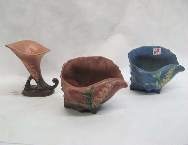 Appraisal: THREE AMERICAN ROSEVILLE ART POTTERY VASES in the Foxglove pattern