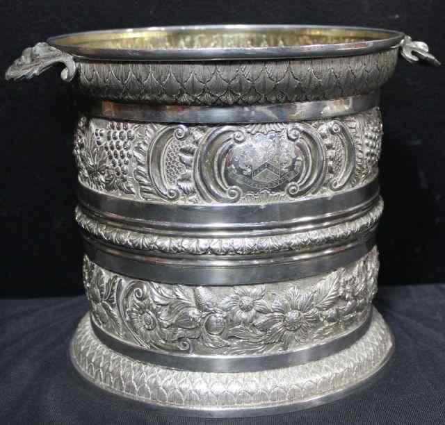 Appraisal: STERLING Ornately Chased English Ice Bucket A magnificent looking ice