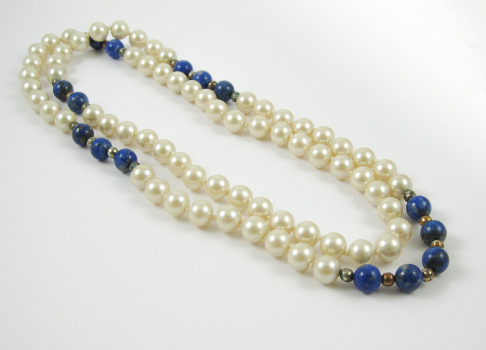 Appraisal: LAPIS LAZULI AND PEARL NECKLACE measuring inches in length and