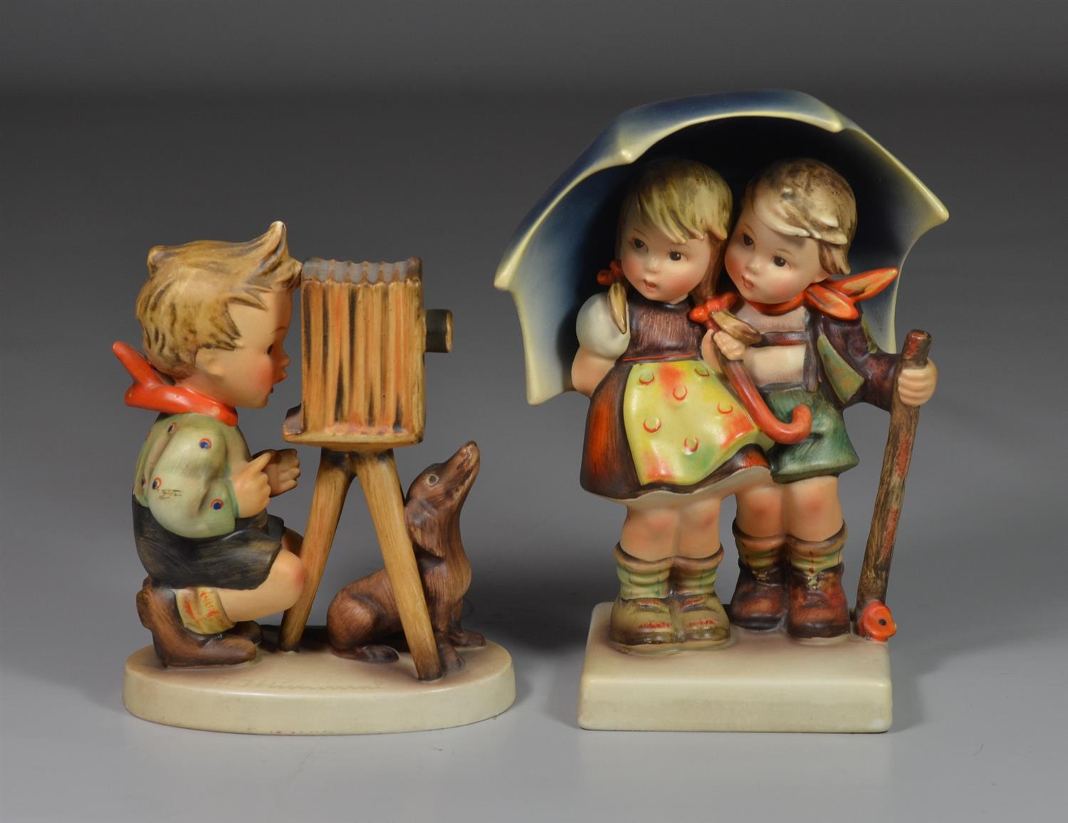 Appraisal: Goebel Hummel Figurines Photographer West Germany Stormy Weather West Germany