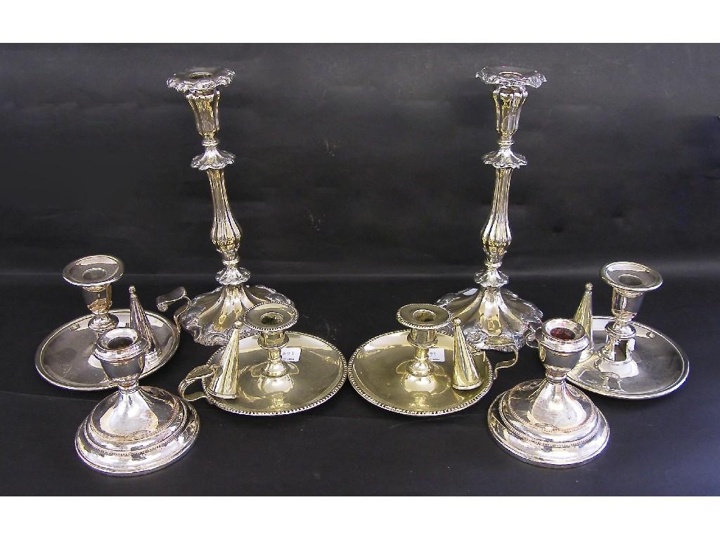 Appraisal: Pair of Victorian style silver plated candlesticks the moulded sconce