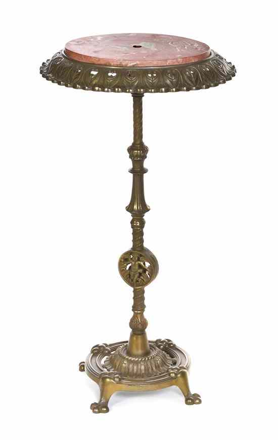 Appraisal: A Continental Brass Pedestal having a marble inset circular top