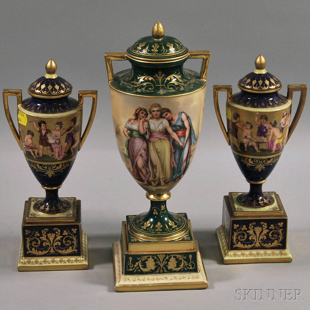 Appraisal: Three Vienna Porcelain Covered Urns th th century one pair