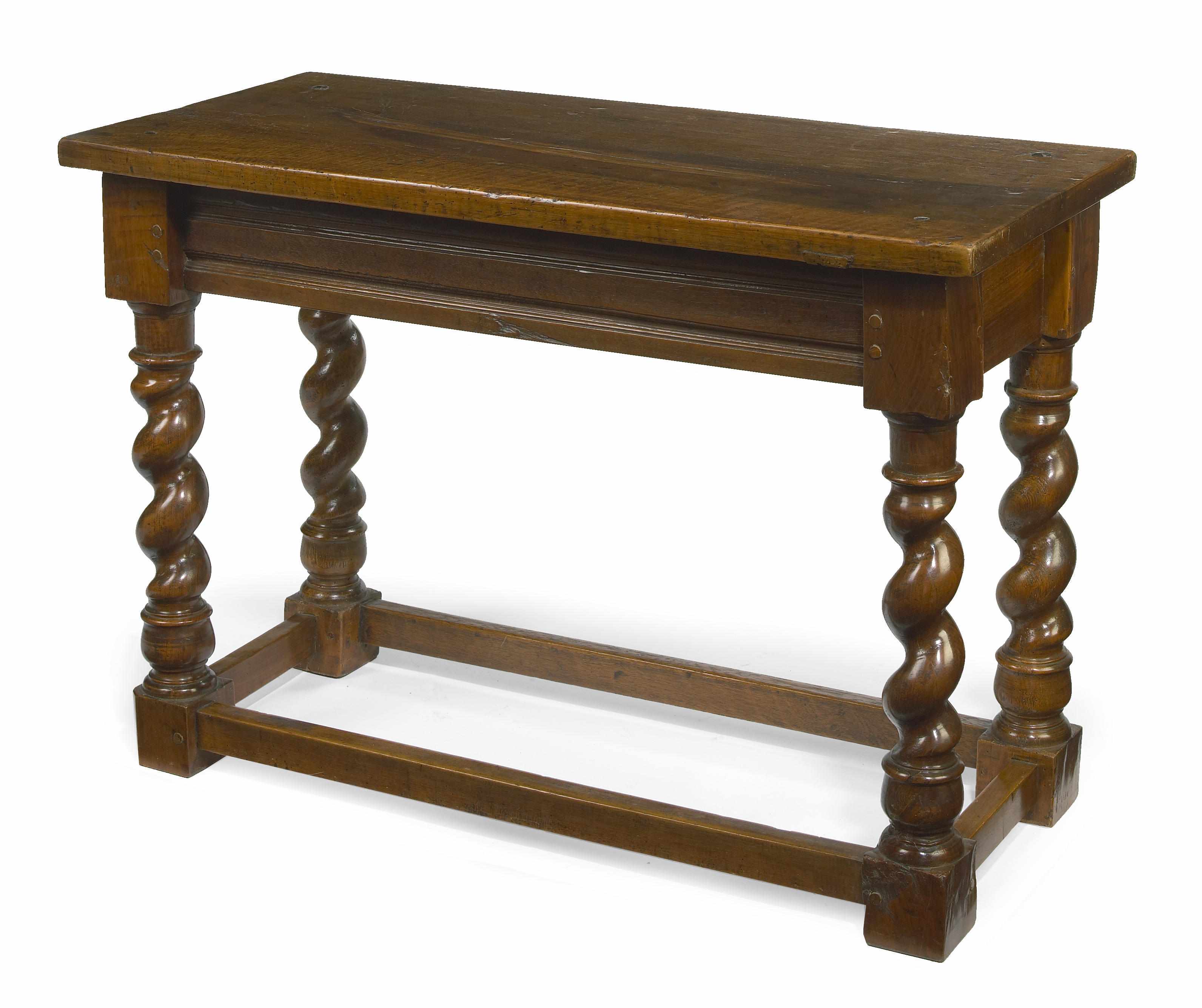 Appraisal: A Louis XIII style walnut table incorporating antique and later