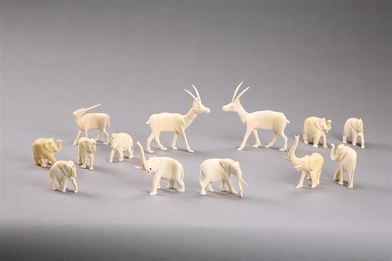 Appraisal: THIRTEEN CARVED ANIMALS Ivory Ten elephants to h and three