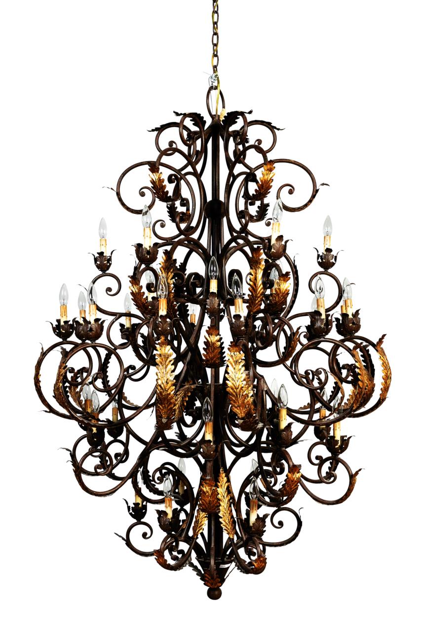 Appraisal: GILT SCROLLED IRON THIRTY-NINE LIGHT CHANDELIER Currey Company thirty-nine light