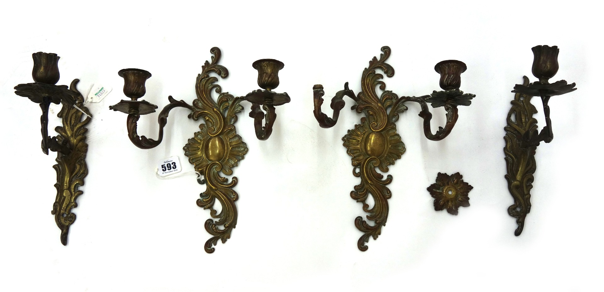 Appraisal: A pair of rococo style gilt metal two light wall