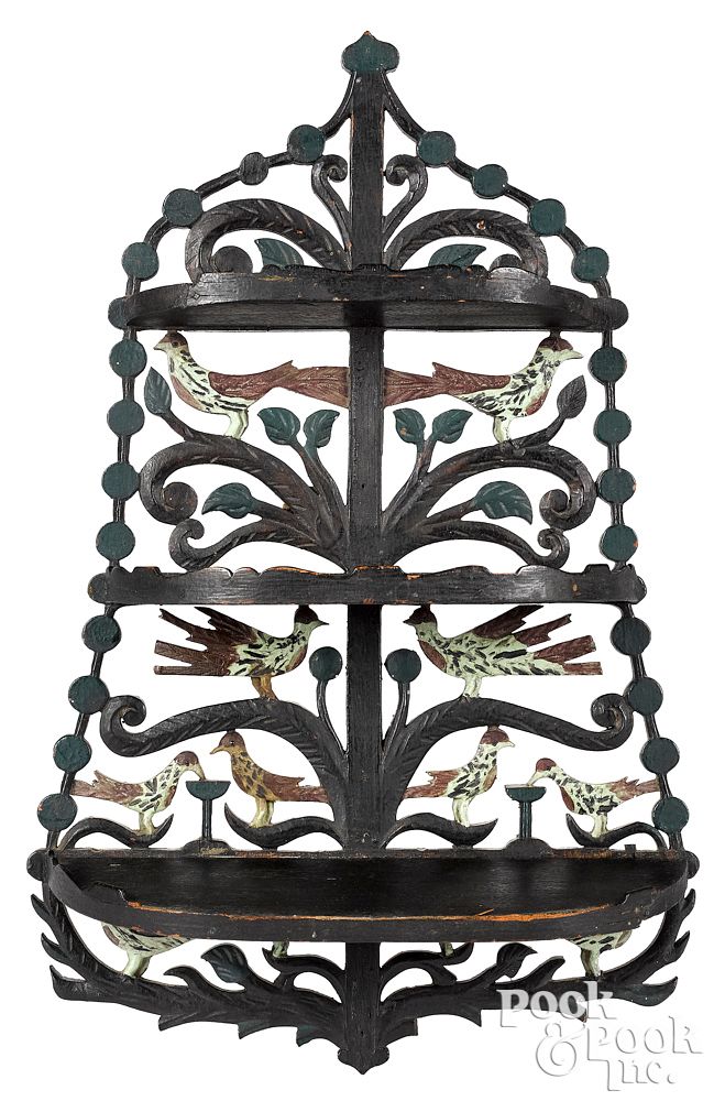 Appraisal: Small carved and painted hanging shelf birds Small carved and