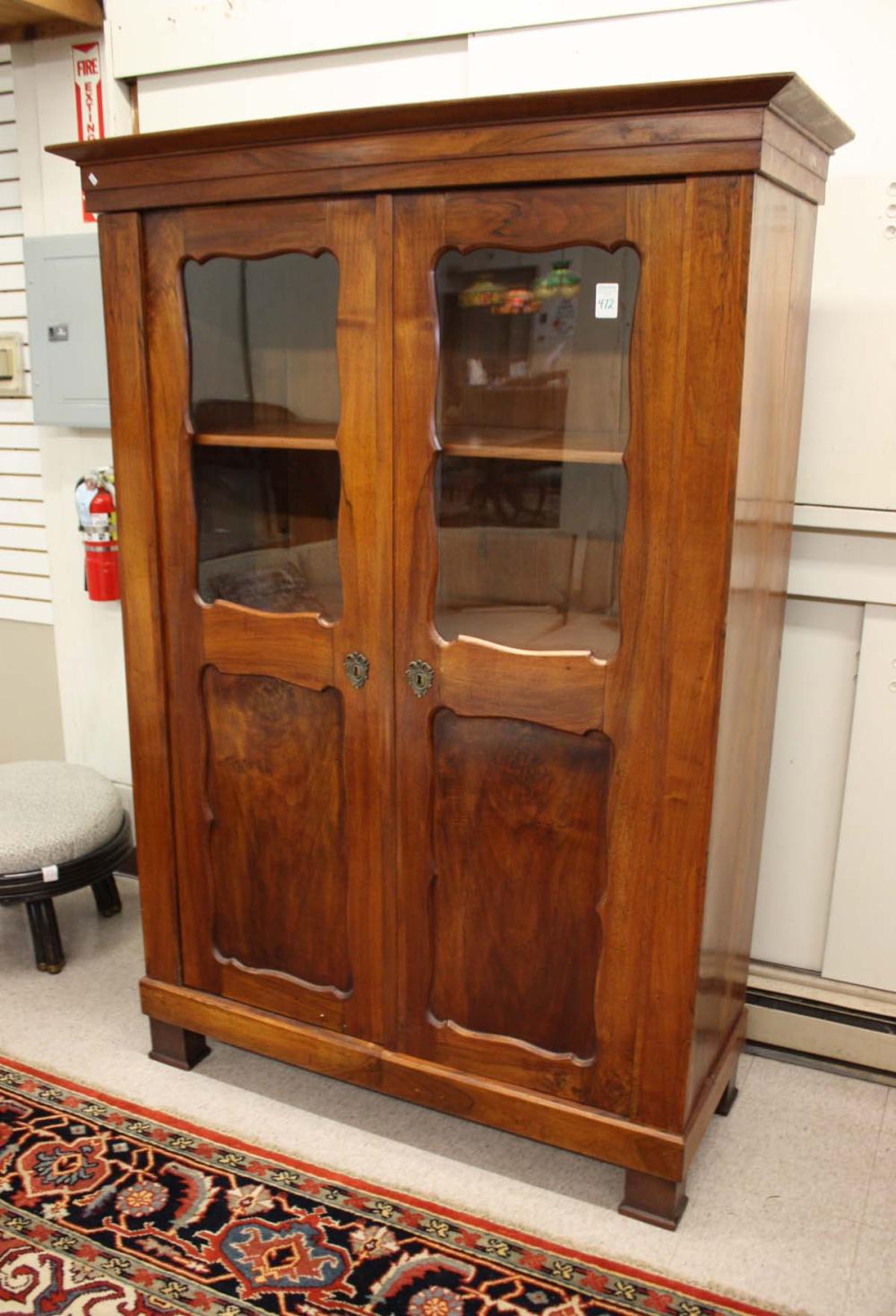 Appraisal: DOUBLE-DOOR MAHOGANY CABINET German th century each door having an