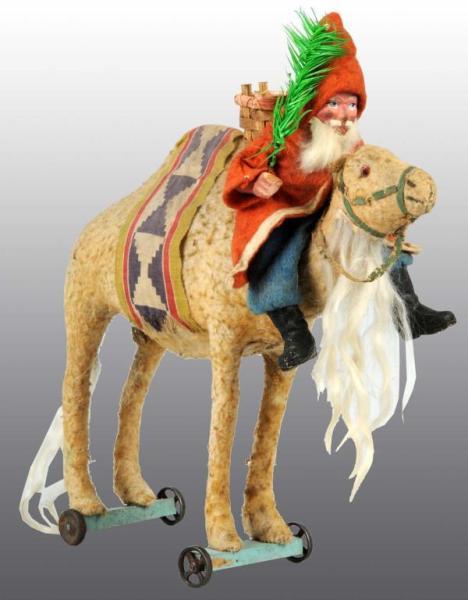 Appraisal: Santa Claus on Camel Christmas Pull Toy Description Santa has