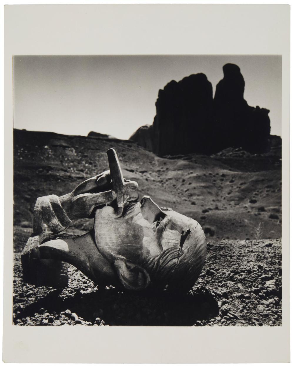 Appraisal: Arthur Tress b American Head of statue in the desert