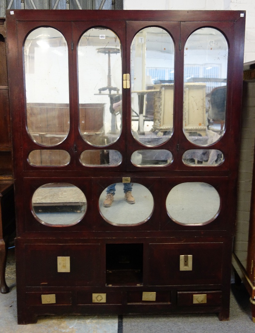 Appraisal: An early th century Chinese mirrored side cabinet with an