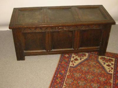 Appraisal: AN OAK PANELLED COFFER early th century with moulded hinged