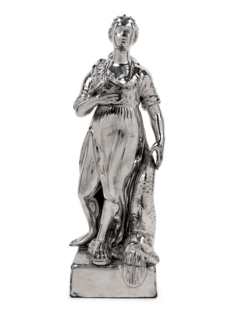 Appraisal: A Staffordshire Lustre-Glazed Figure A Staffordshire Lustre-Glazed Figure Circa -