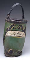 Appraisal: EARLY PAINTED LEATHER FIRE BUCKET The green handled fire bucket