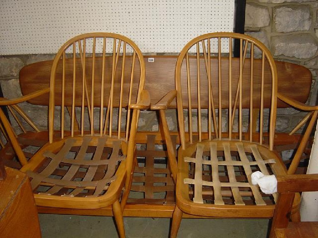 Appraisal: A pair of 'Ercol' hoop and stick back lounge chairs