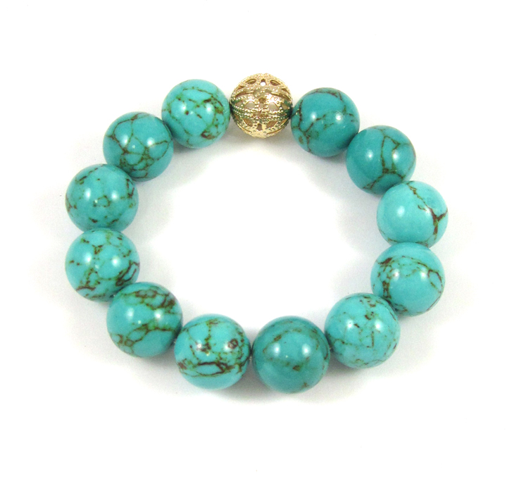 Appraisal: TURQUOISE STRETCH BRACELET with twelve large round natural turquoise beads