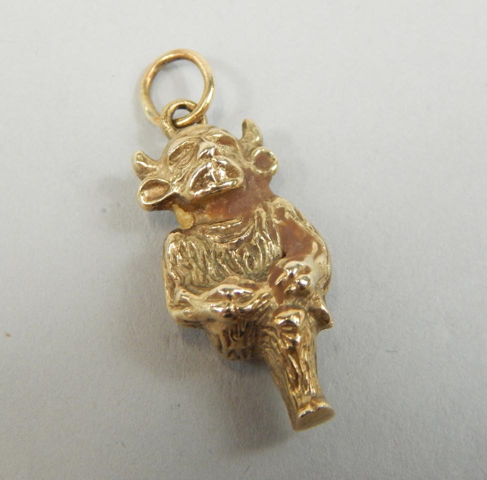 Appraisal: A Lincoln Imp charm with hook end yellow metal marks