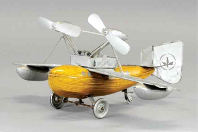 Appraisal: BING AMPHIBIAN AIRPLANE Interesting clockwork duo-motor single wing plane with