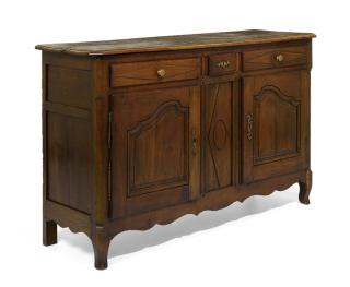 Appraisal: A FRENCH PROVINCIAL WALNUT SIDEBOARD A FRENCH PROVINCIAL WALNUT SIDEBOARD