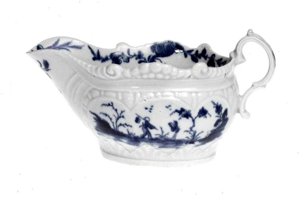 Appraisal: A WORCESTER SAUCE BOAT moulded with strap fluting and two