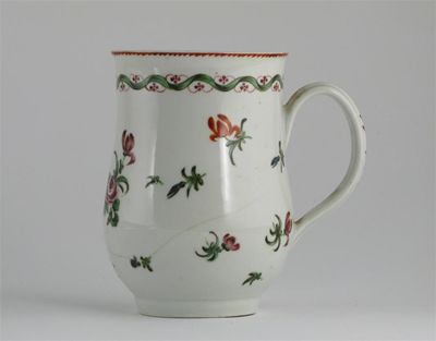 Appraisal: A Champion's Bristol mug painted with scattered flowers beneath a