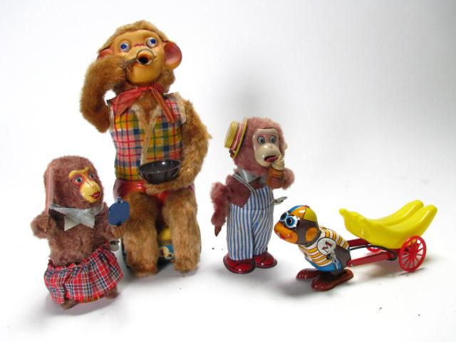 Appraisal: Group of five vintage mechanical monkey toys all Japanese including