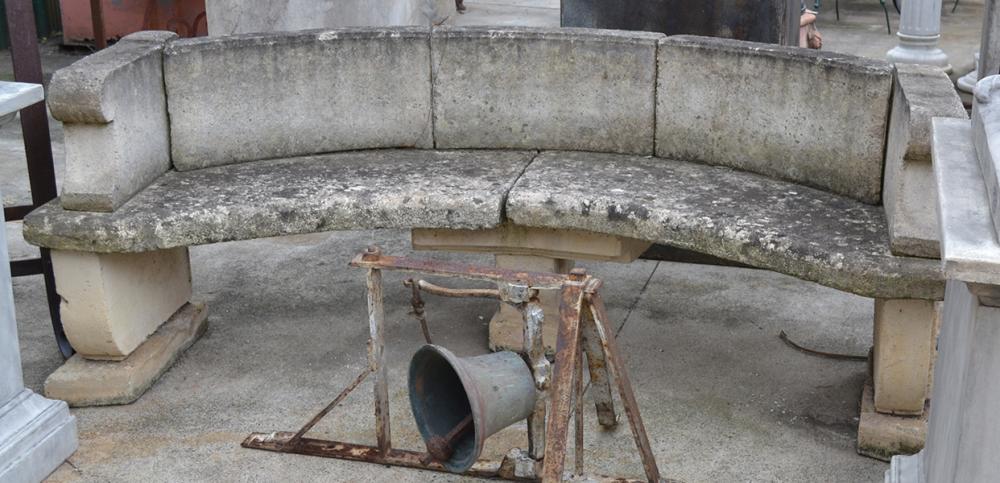 Appraisal: A TH CENTURY CURVED RECONSTITUTED STONE GARDEN BENCH on three