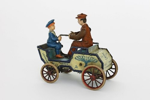 Appraisal: A Lehmann clockwork carriage Naughty Boy and Uncle the young