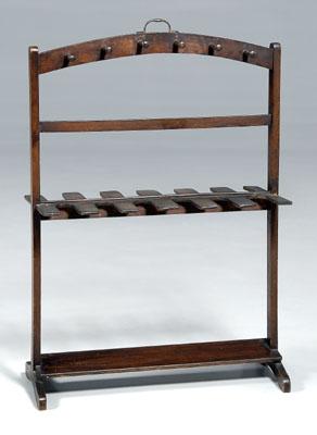 Appraisal: Mahogany equestrian boot rack arched top with pegs for riding