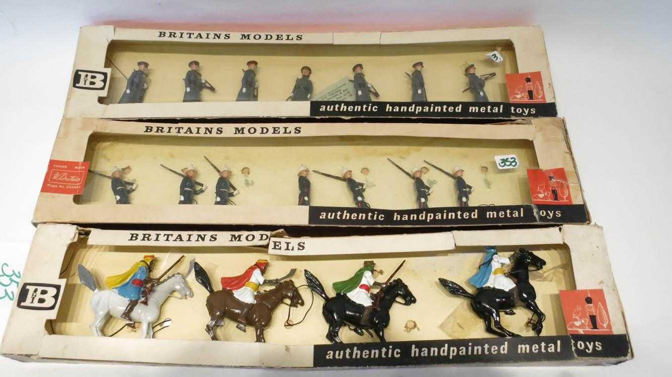 Appraisal: THREE SETS OF BRITIANS MODELS TOY SOLDIERS hand painted metal