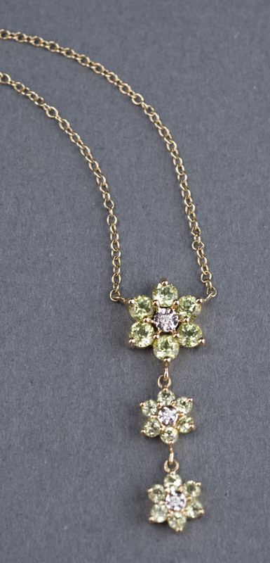 Appraisal: KT yellow gold peridot pendant Pendant contains genuine peridot clusters